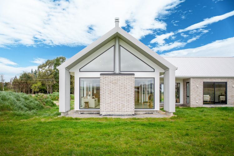 Architecturally designed rural 4 bedroom home brick and long run iron cladding Cust