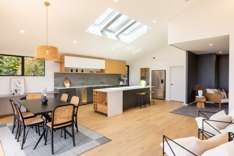 Architectural 2 storey passive SuperHome kitchen dining skylights lounge built on steep hill slope Cashmere