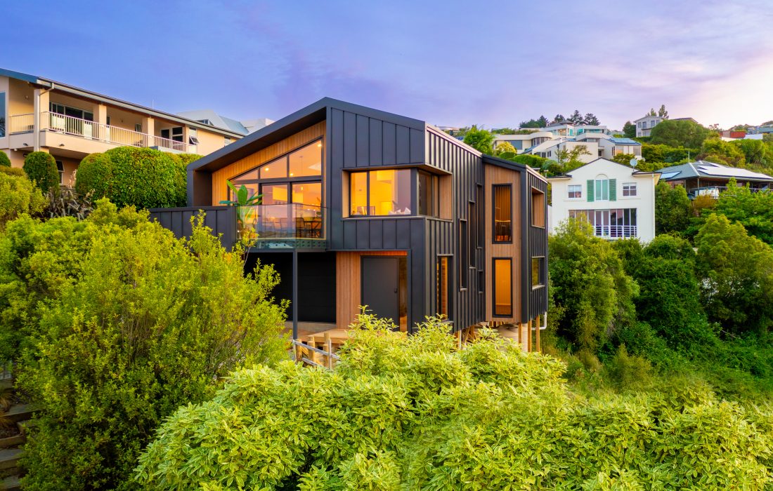 Architectural 2 storey passive SuperHome abodo cladding built on steep hill slope Cashmere